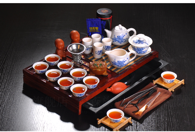 Kung fu tea set the whole kettle set of blue and white porcelain ceramic teapot solid wood tea tray tea ceremony
