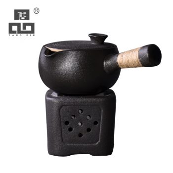 Black crockery ceramic tea warmer and matching tea pot